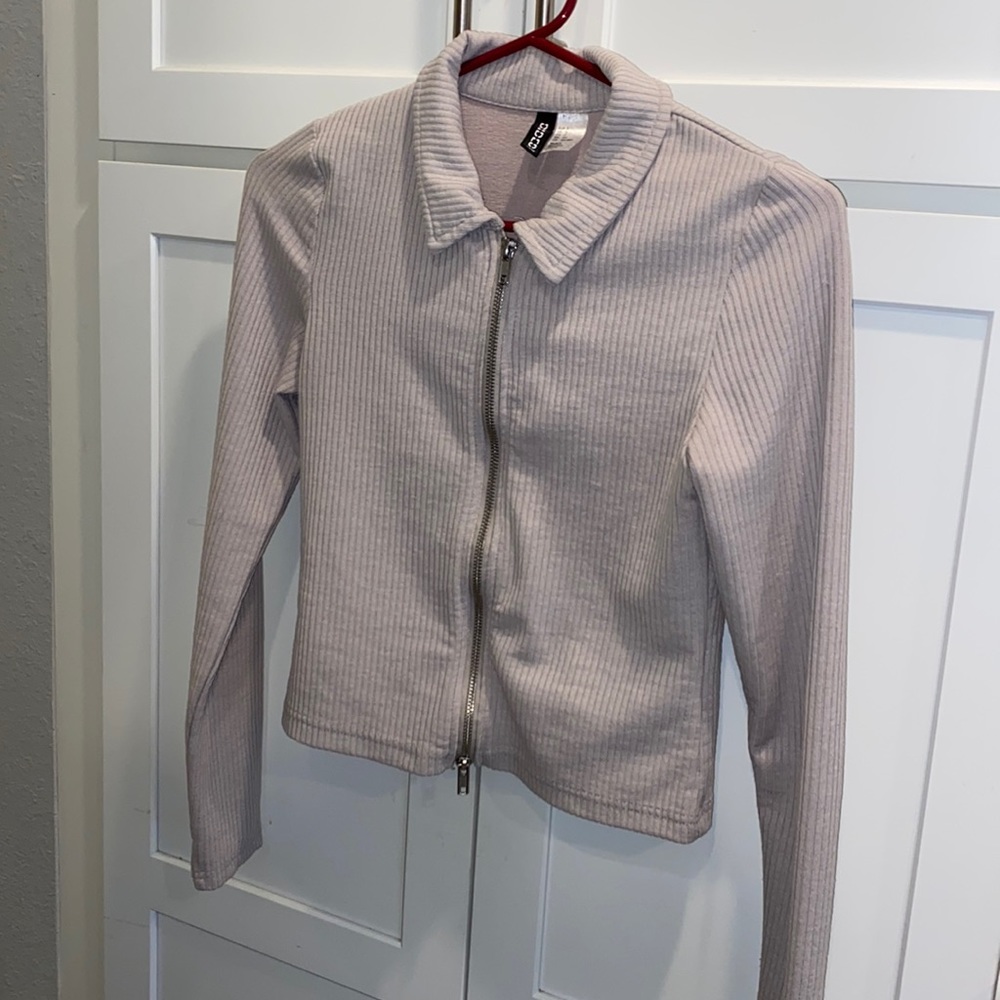 A zipped up blouse with collar tan